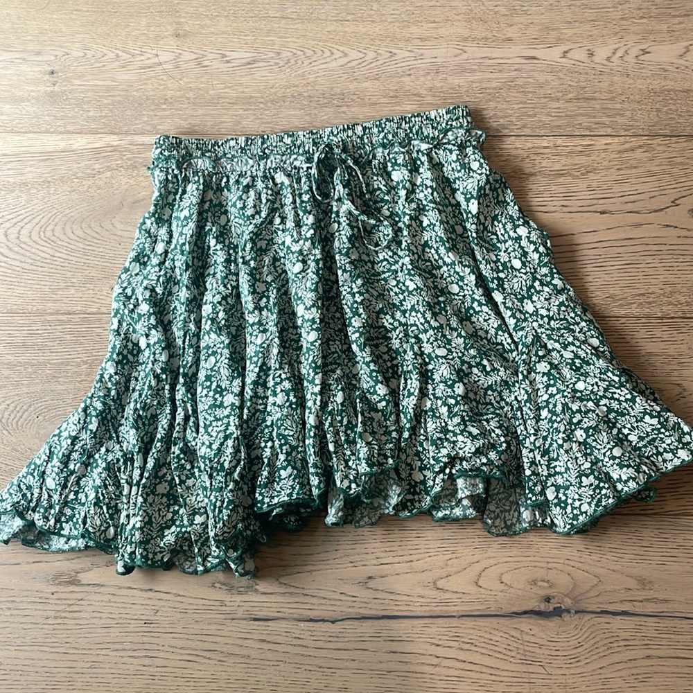 Green floral mini skirt